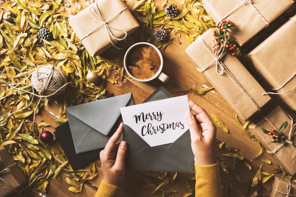 writing greeting cards, christmas table top flat lay