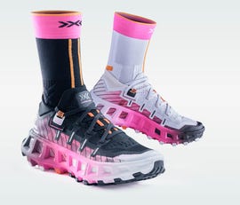 Two pairs of modern athletic shoes with vibrant designs and matching socks
