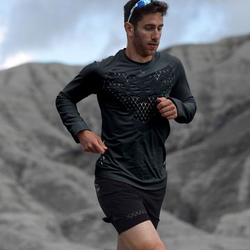 a man running on a mountain