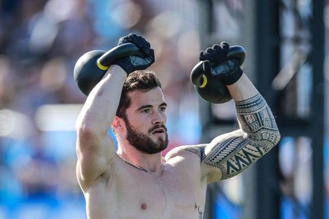 Championship, Arm, Competition event, Muscle, Facial hair, Player, Neck, Recreation, Fan, Sports equipment, 