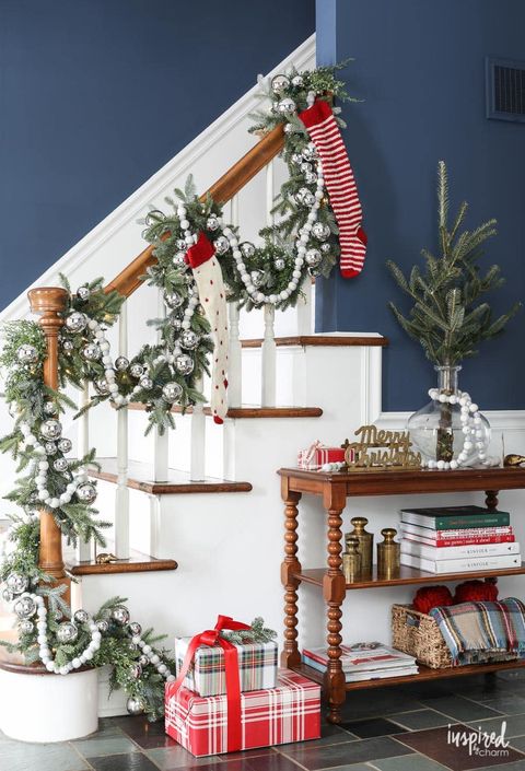 white and silver christmas stair decor