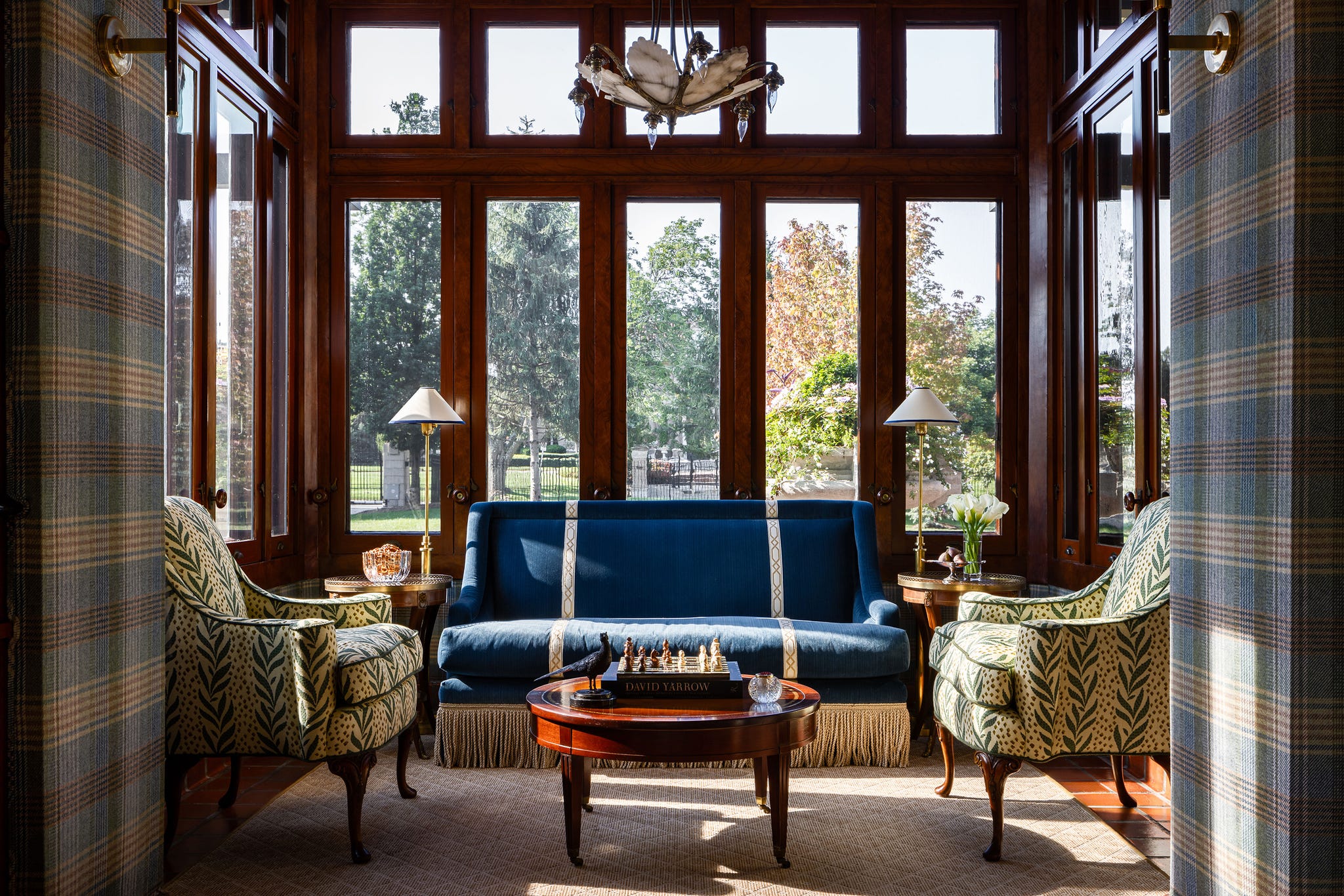 a living room with a blue couch