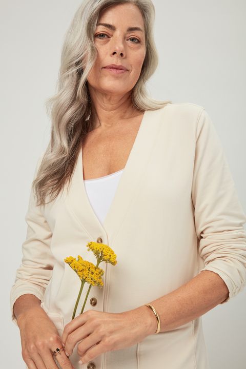 woman older gray hair cardigan clothing