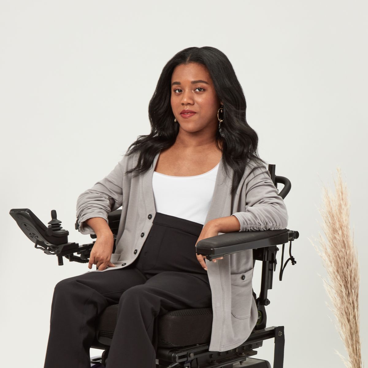 woman disabled wheelchair clothing cardigan pants