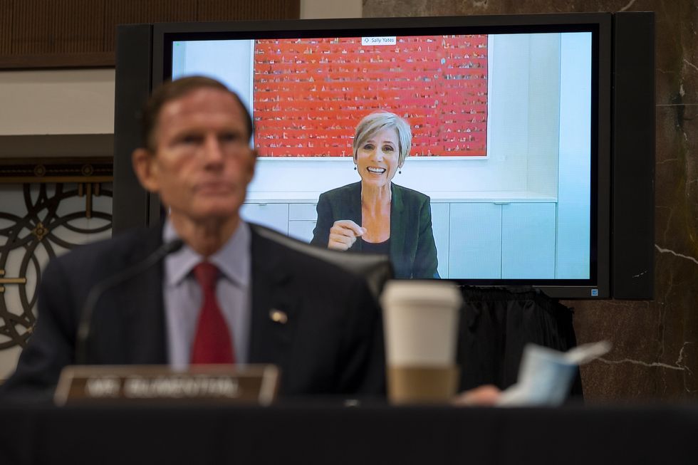 washington, dc   august 05  sally yates, former deputy attorney general, testifies virtually as sen richard blumenthal, d ct, listens in the foreground during a senate judiciary committee hearing on "oversight of the crossfire hurricane investigation" on capitol hill on august 5, 2020 in washington, dc crossfire hurricane was an fbi counterintelligence investigation relating to contacts between russian officials and associates of donald trump photo by carolyn kaster poolgetty images