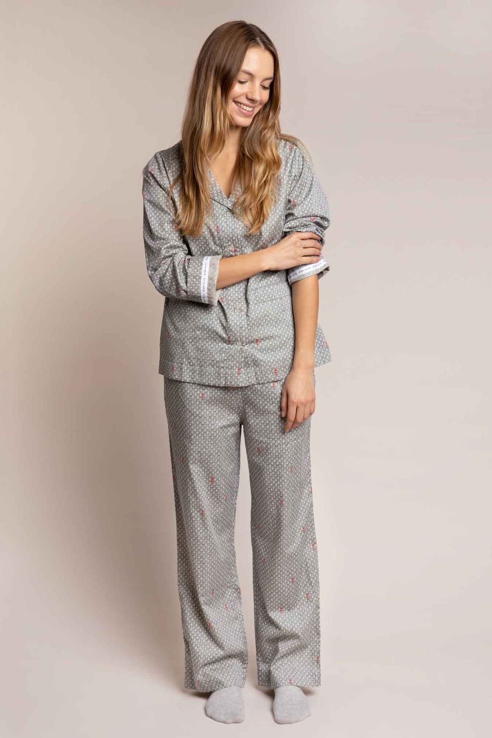 woman wearing grey pyjamas