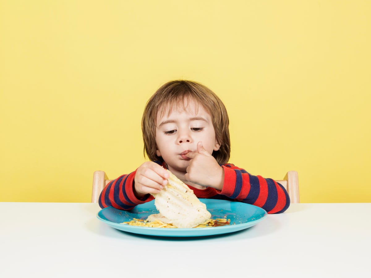 https://hips.hearstapps.com/hmg-prod/images/year-old-boy-eating-breakfast-royalty-free-image-1573224019.jpg?crop=1xw:0.74975xh;center,top&resize=1200:*