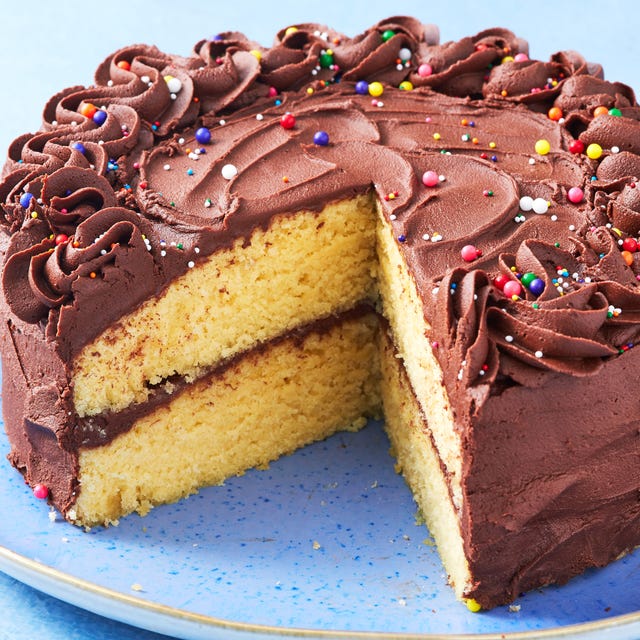 yellow cake topped with chocolate frosting and sprinkles