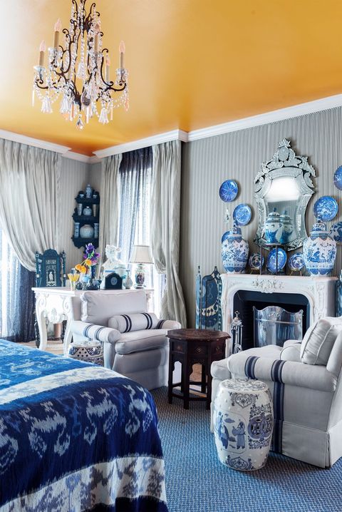 blue and yellow bedroom with painted ceiling