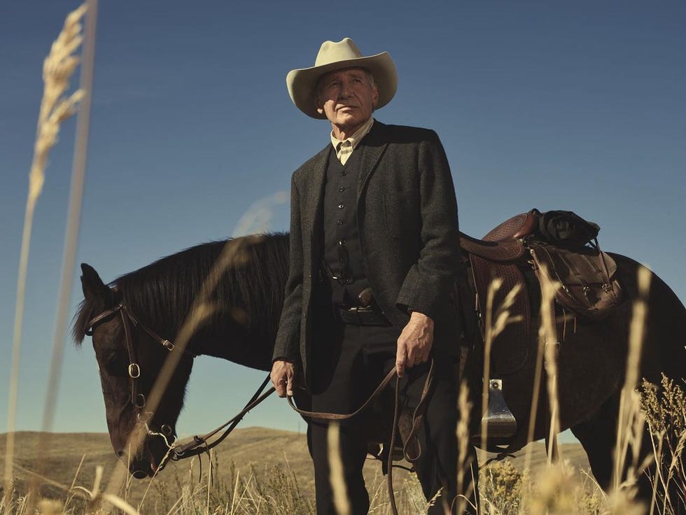 harrison ford walks a horse in yellowstone 1923