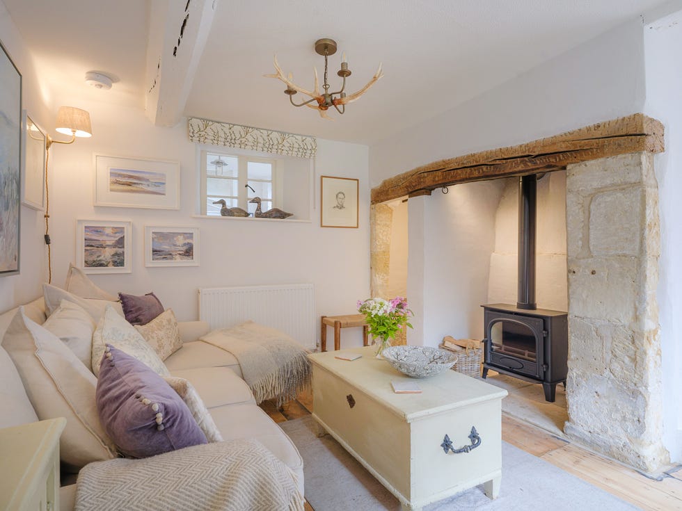 a living room with a fireplace