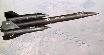 black military jet airplane over the desert