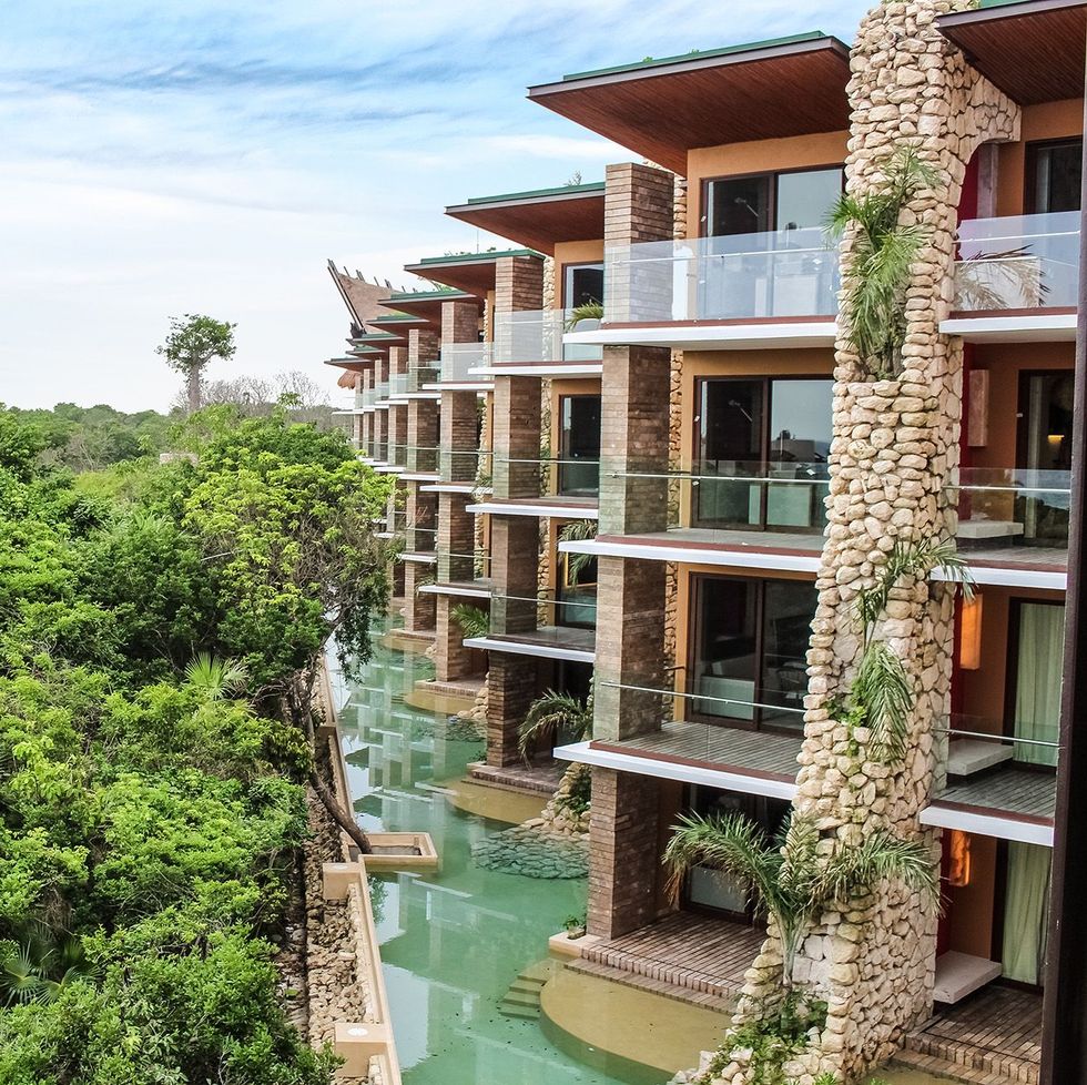 the pool and balconies at hotel xcaret mexico, a good housekeeping pick for best all inclusive family resorts