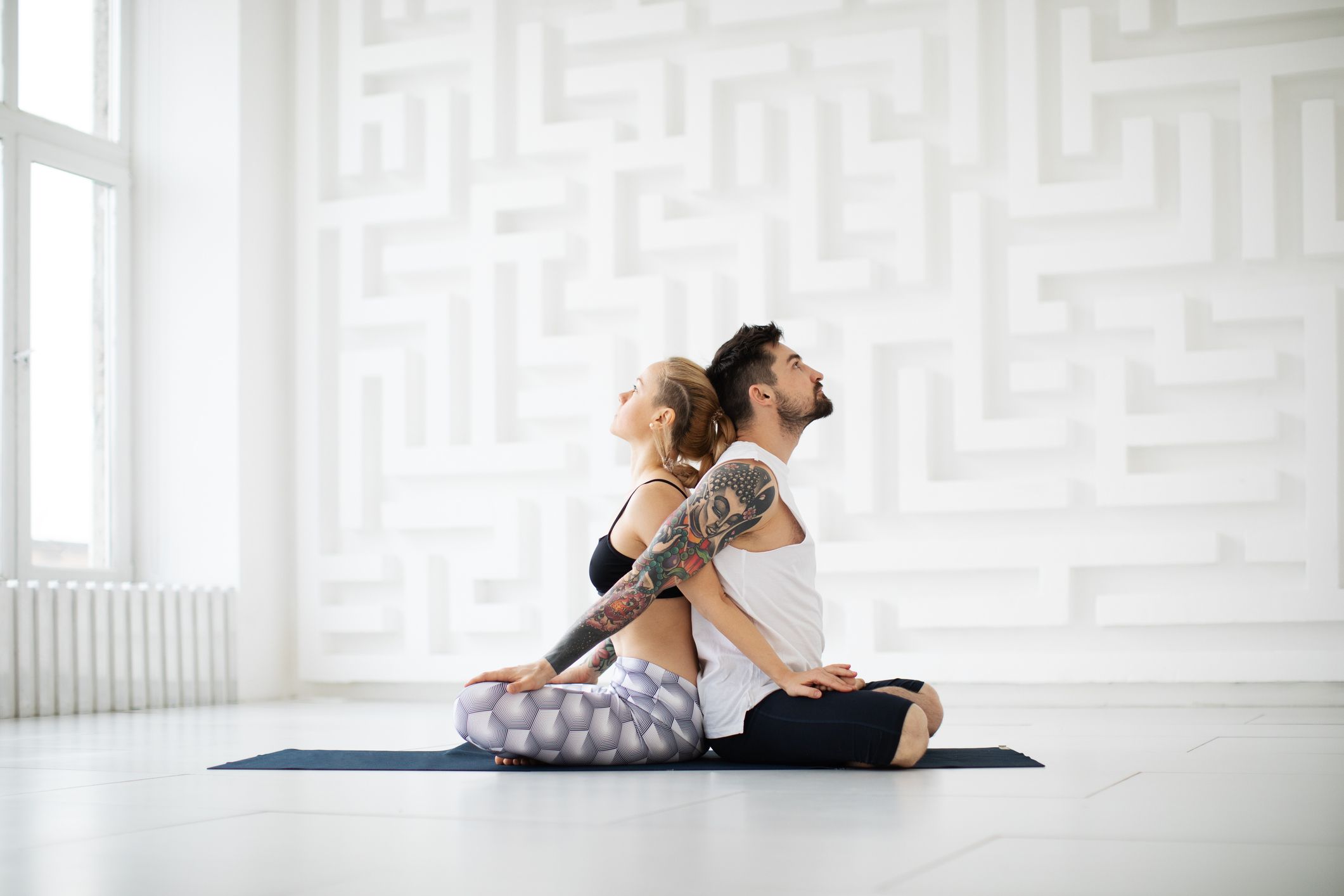 Siblings practicing partner yoga poses at gym - Stock Photo [89105921] -  PIXTA