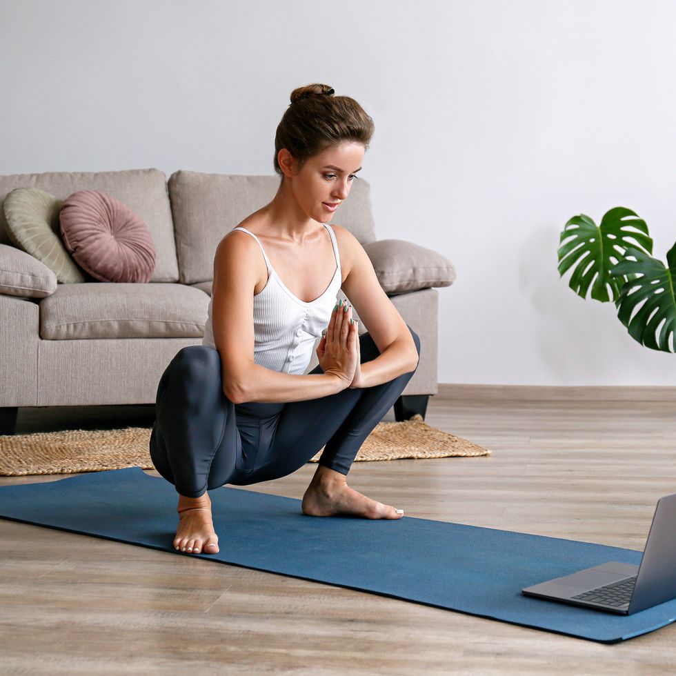 yogini exercising at home