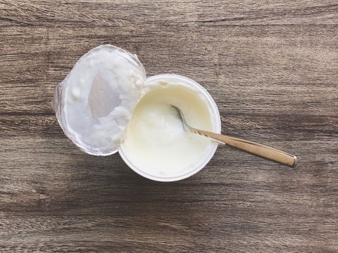 yogurt on wood background