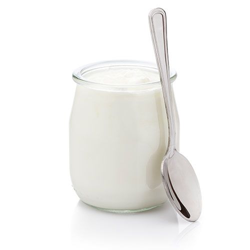 yogurt in glass jar with spoon