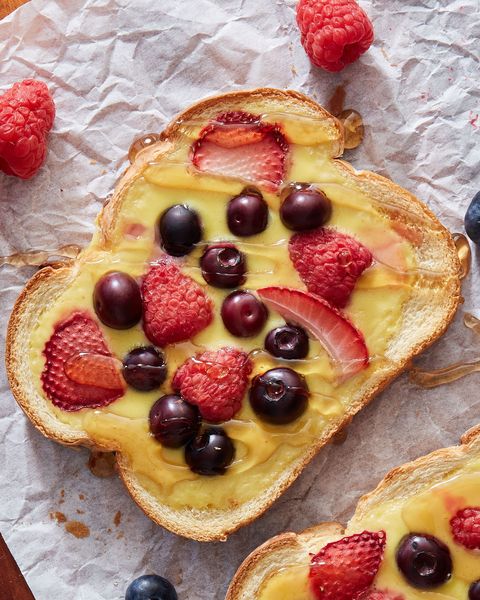 yogurt toast topped with berries and maple syrup