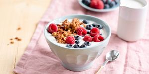 Yogurt with granola and berries in bowl