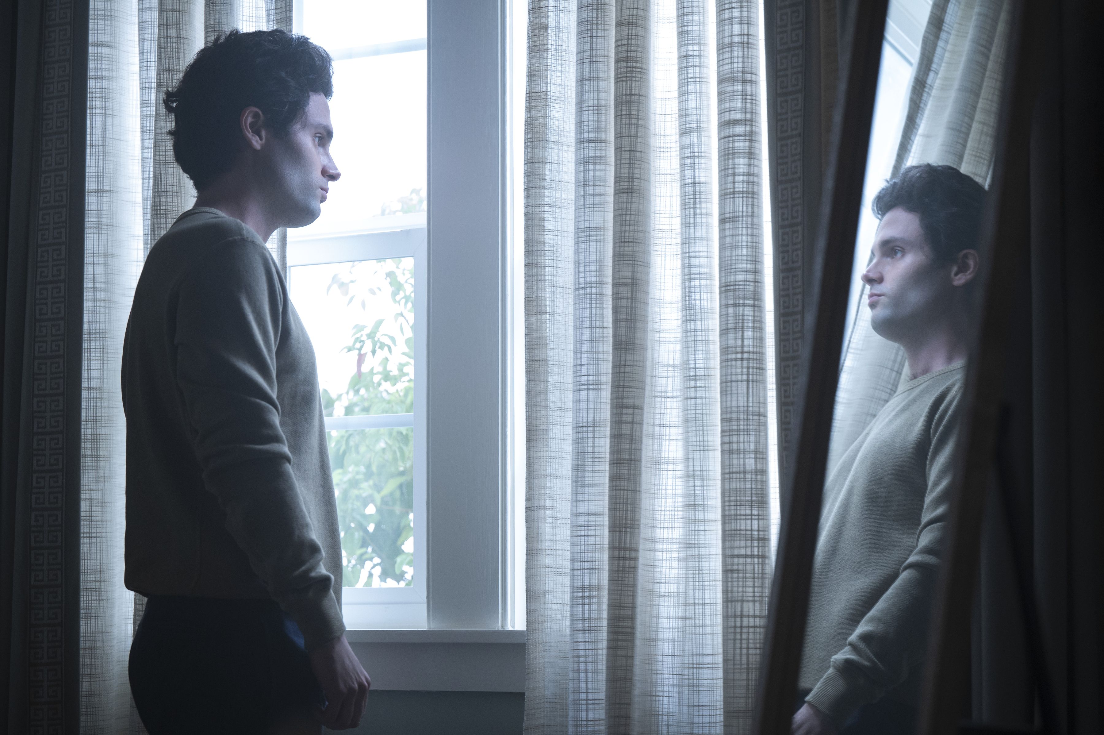 you l to r penn badgley as joe goldberg in episode 301 of you cr john p fleenornetflix © 2021