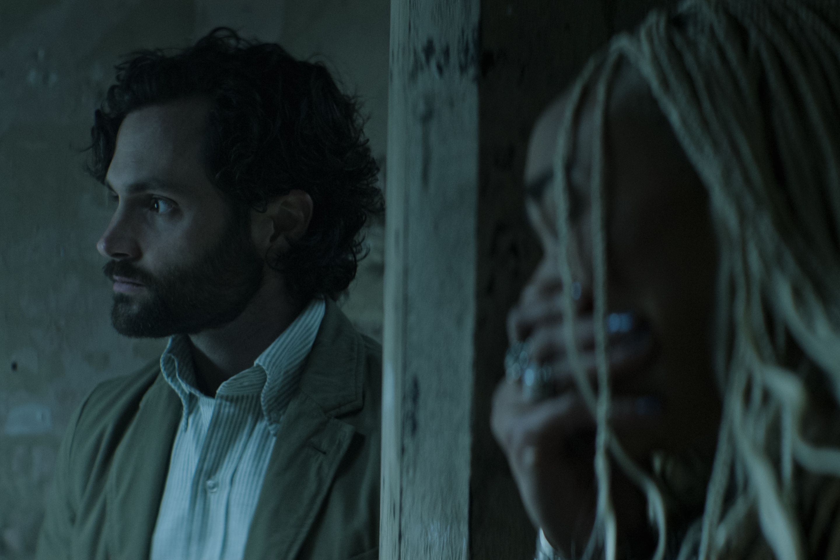 you l to r penn badgley as joe, tati gabrielle as marienne in episode 401 of you cr courtesy of netflix © 2022