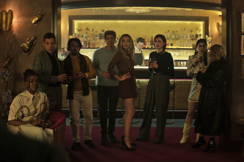 you l to r ozioma whenu as blessing, ben wiggins as roald, dario coates as connie, lukas gage as adam, tilly keeper as lady phoebe, charlotte ritchie as kate and niccy lin as sophie soo in episode 403 of you cr courtesy of netflix © 2022