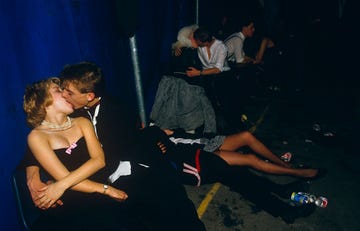 england london young adolescent couples kiss at the gatecrashers' ball