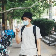 young asian man with protective face mask