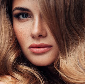 Young beautiful model with long wavy well groomed hair young beautiful model with long wavy well groomed hair