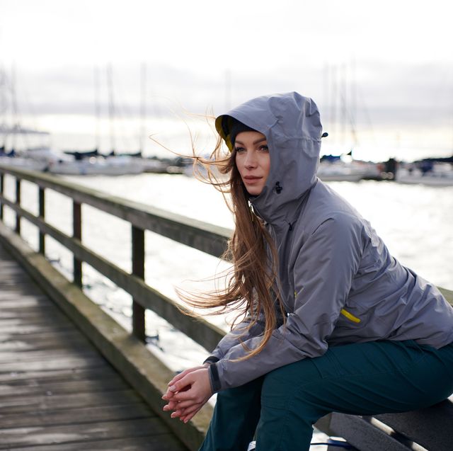 https://hips.hearstapps.com/hmg-prod/images/young-beautiful-woman-wearing-rain-jacket-in-cold-royalty-free-image-1671534035.jpg?crop=0.670xw:1.00xh;0.244xw,0&resize=640:*