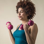 adjustable dumbbells weights - Young black female excercising with weights young black female excercising with weights
