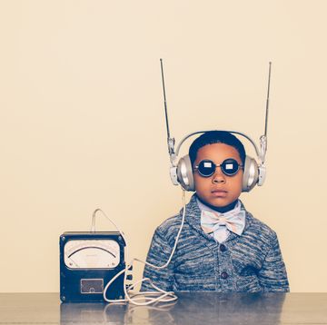 Young Boy Dressed as Nerd with Alien Headphones
