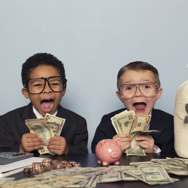 young business children make faces holding lots of money