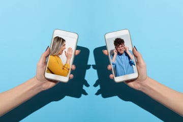 young couple arguing through a smartphone