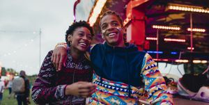 young couple at a funfair