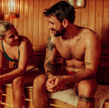 young couple enjoying a sauna at a spa resort