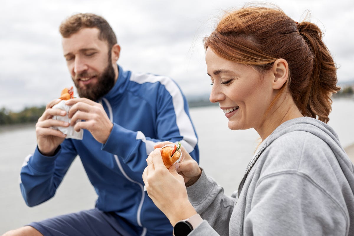 young couple enjoying a snack