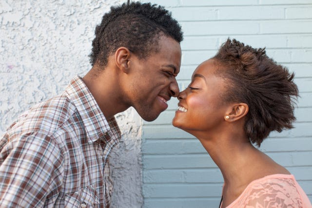 young couple touching noses