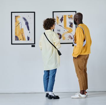 young couple visiting art gallery