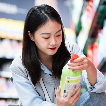 Woman shopping for everyday household products woman shopping for household cleaning products