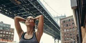 young female runner taking a break, new york, usa