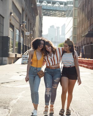 Young females hanging out in city