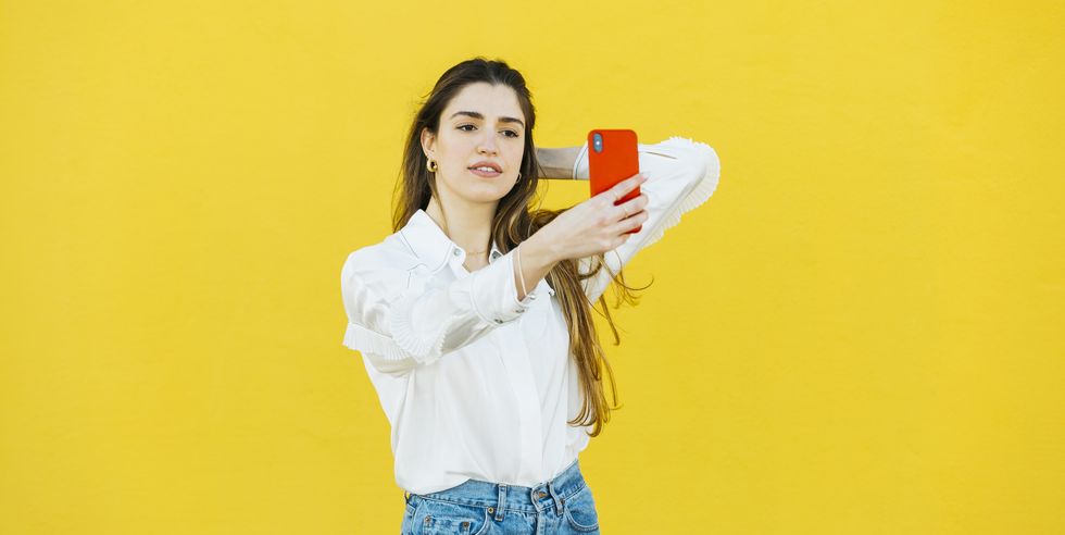 young girl taking a selfie