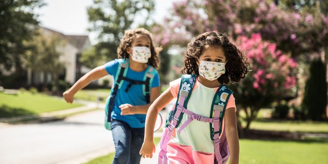 Teenage Girl In Reusable Protective Face Mask Drinking Water Outdoors In  Campus Or Schoolyard New Normal And Back To School Concept After Covid19  Quarantine High-Res Stock Photo - Getty Images