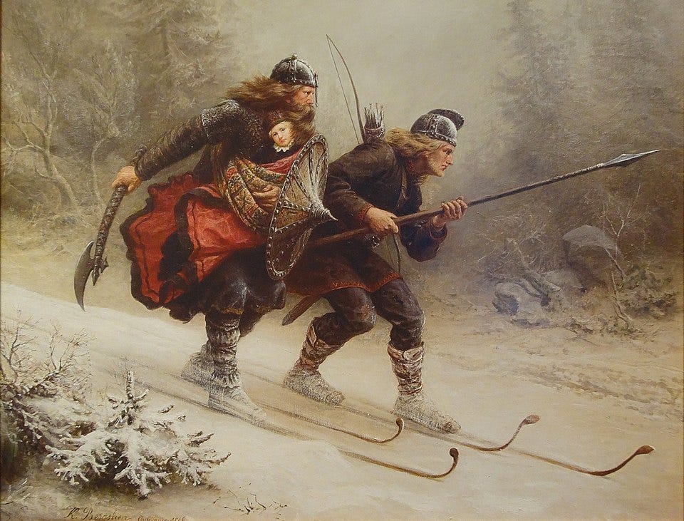 two figures ski through a snowy landscape, one with a child in his arms