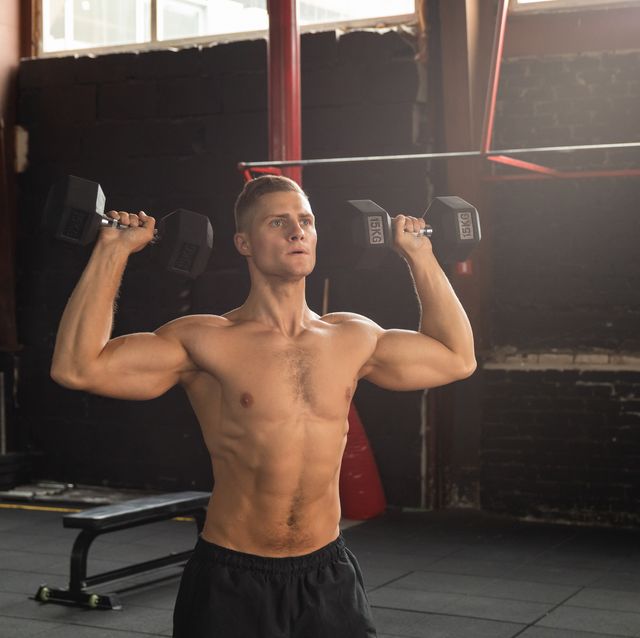 How to Do the Standing Shoulder Press for Stability, Strength and Size