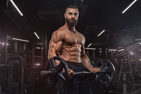 Young Handsome Male Athlete Bodybuilder Weightlifter With Idial
