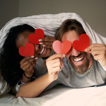 young happy couple in bed