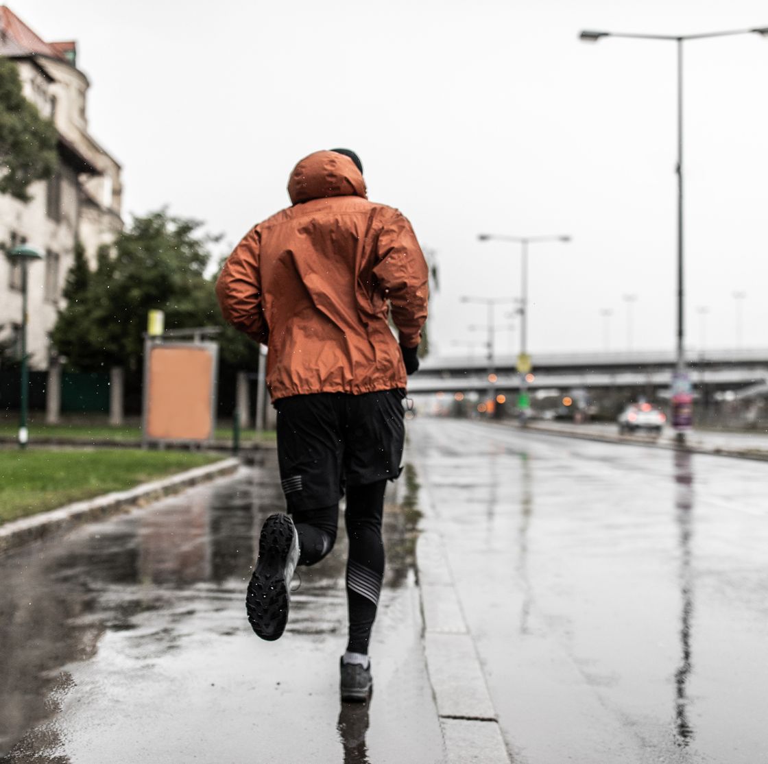 young male athlete running outdoors