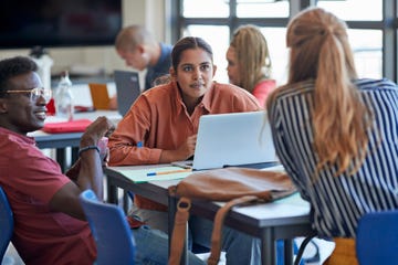 young man and woman looking at university student